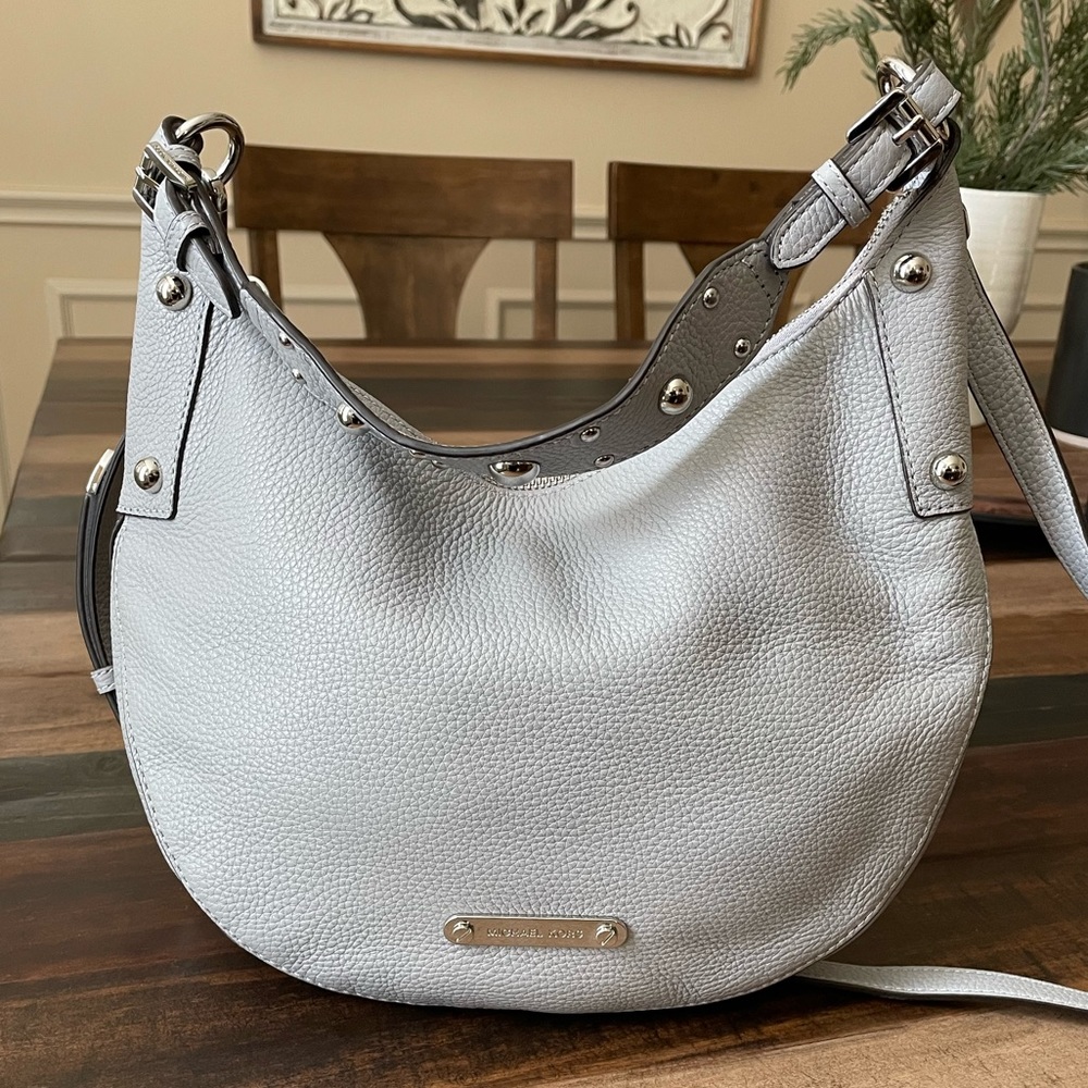 Gray Michael Kors leather shoulder purse.